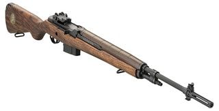 Semi-automatic .308 Winchester rifle with Walnut stock.